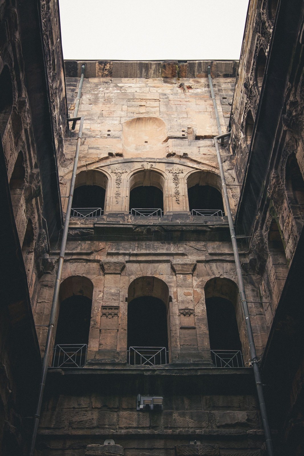 Looking upwards through the Roman Porta Nigra in Trier