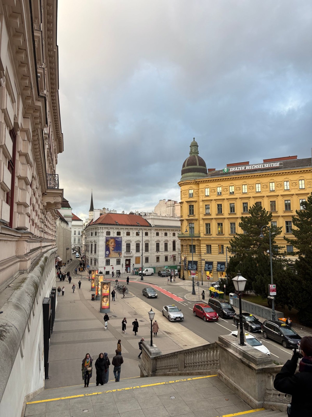 Historic facades and pedestrians in central Vienna