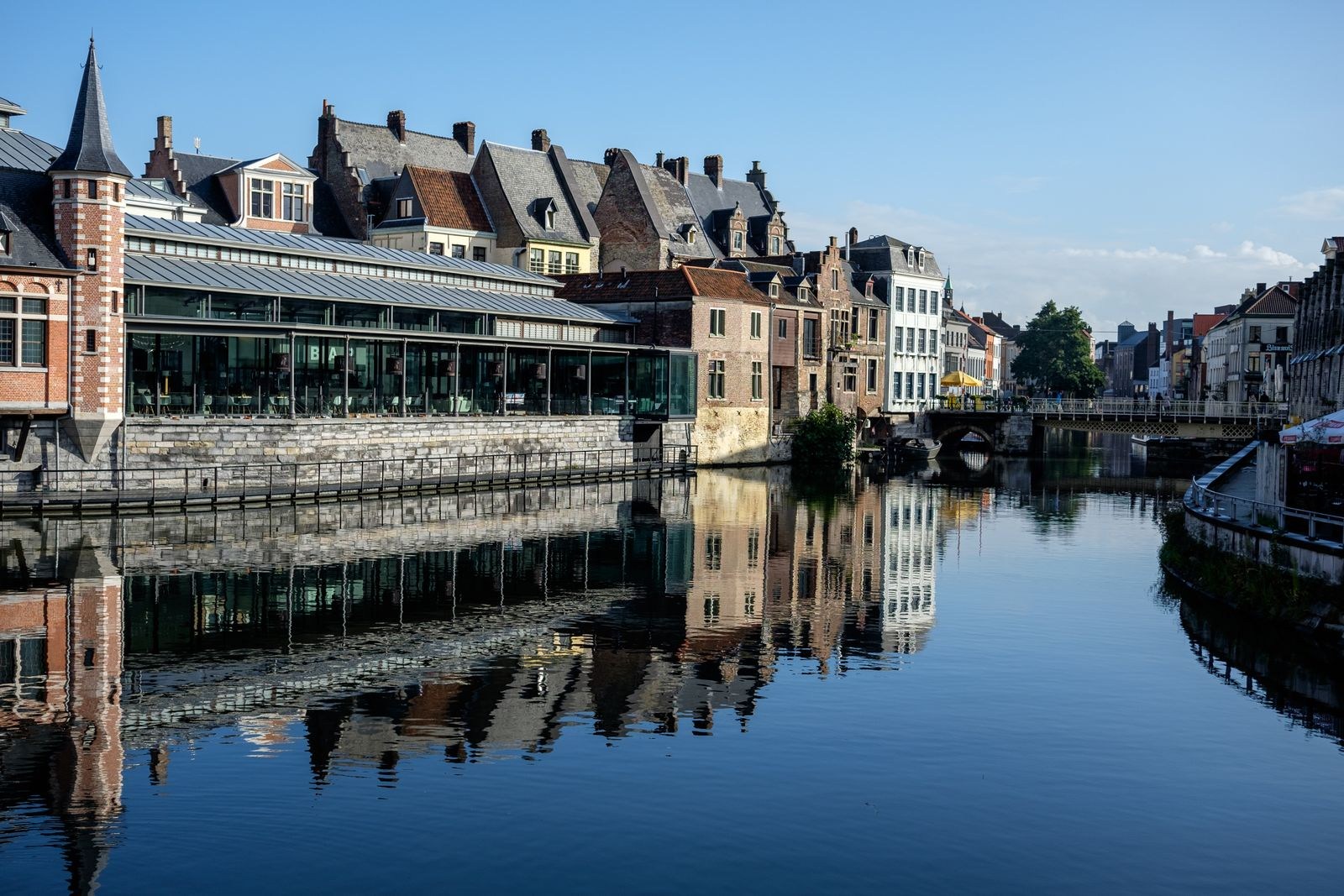 Historic houses and their reflections at Graslei in Ghent