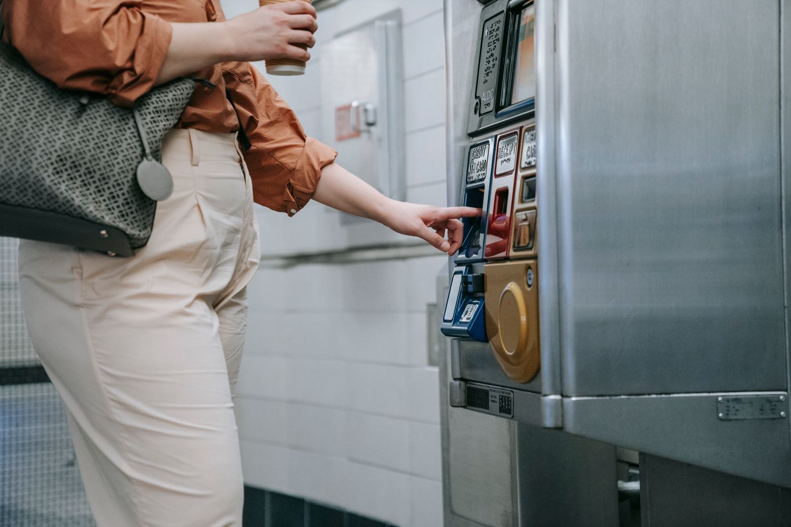 Traveler using a ticket machine