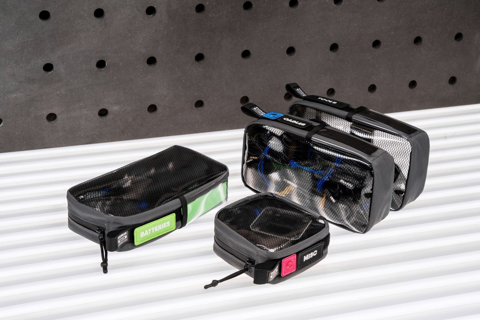 Separate organiser pouches for cables and accessories